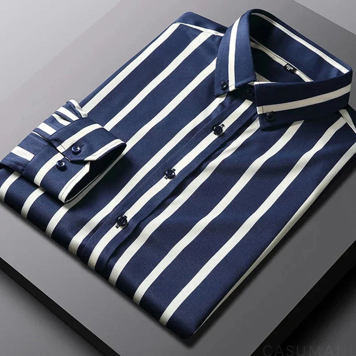Soft men's long sleeve button-down shirt, featuring a crisp striped pattern and a relaxed fit for all-day comfort.