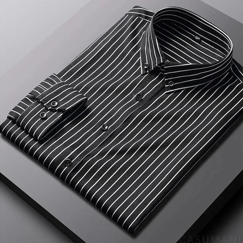Stylish men's striped button-down shirt. Relaxed fit long sleeve ideal for smart casual or everyday men's fashion.