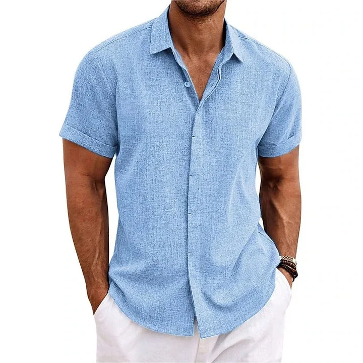 Casual men's vacation button-down shirt. Relaxed fit, perfect beachwear for sunny, warm weather style.