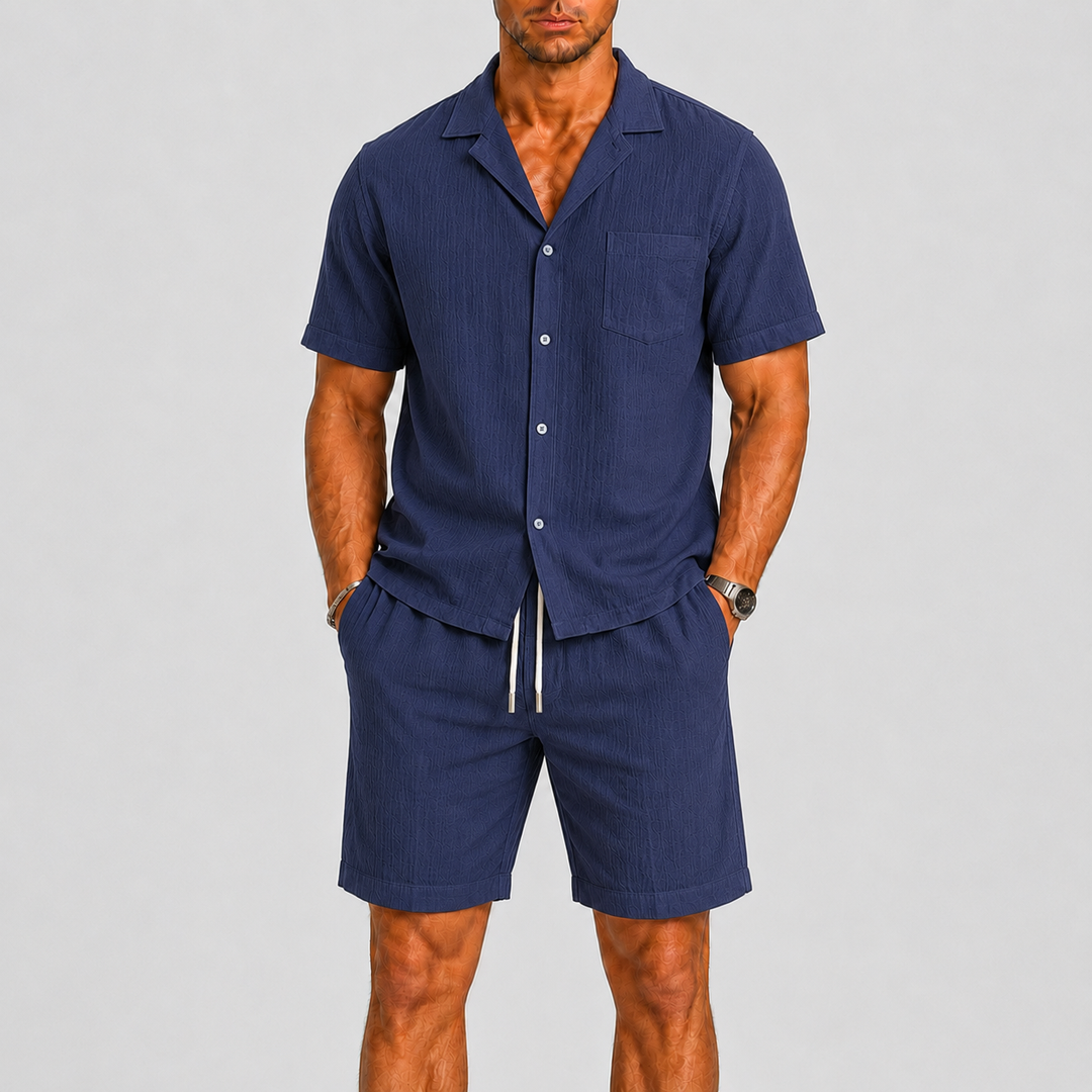 Casual men's relaxed fit summer outfit: short sleeve button-up shirt and matching shorts for daily wear.
