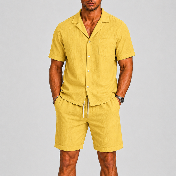 Men's relaxed two-piece summer clothing set, including a comfortable shirt and shorts for warm weather.