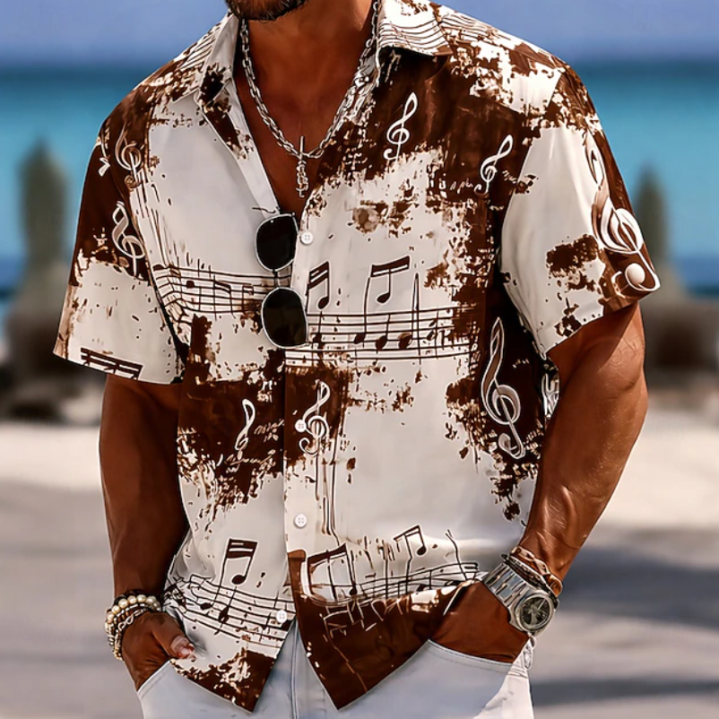 Relaxed fit men's casual shirt with a cool abstract splash print. Ideal for summer holidays & men's fashion.
