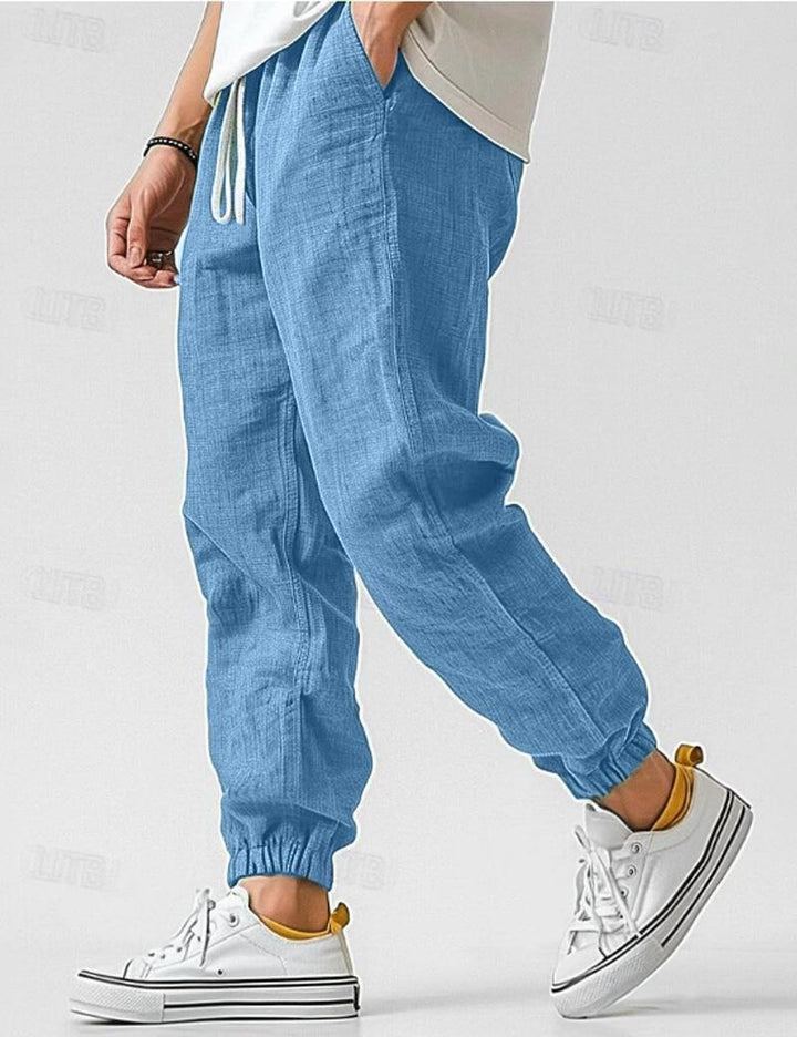 Men's relaxed fit summer trousers, comfortable and stylish for warm weather.