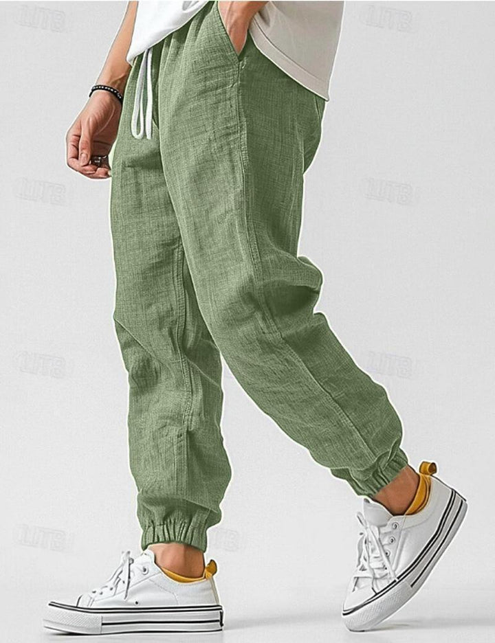 Comfortable men's relaxed fit trousers, ideal for summer and easy warm weather wear. Versatile and breathable.