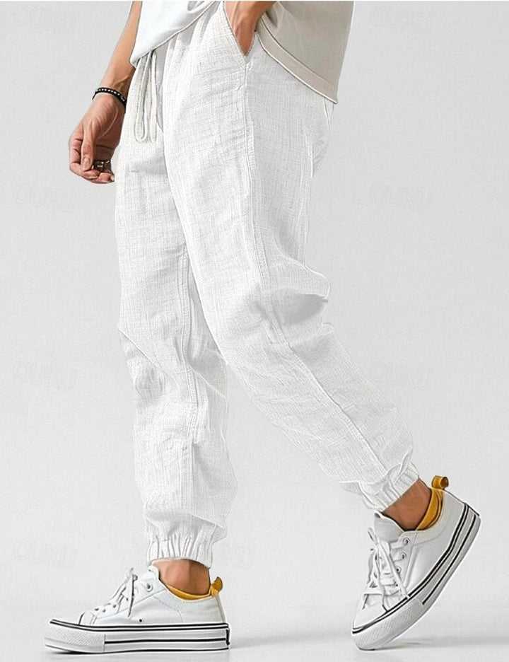 Lightweight men's summer trousers with a relaxed fit, designed for breathable comfort in warm weather.