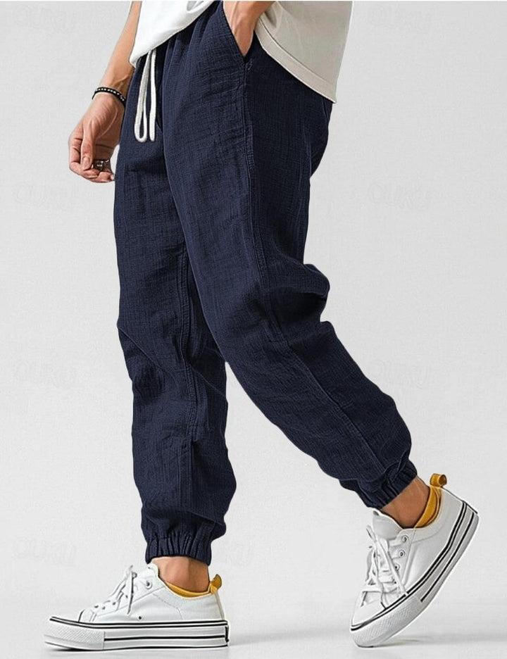 Easy care men's lightweight relaxed fit trousers, offering ultimate comfort and style for summer warm weather.