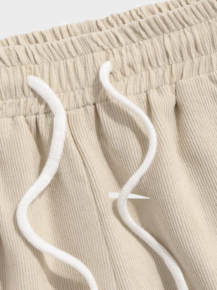 Vacation-ready men's two-piece outfit. Relaxed fit shirt & shorts for a comfortable summer holiday.