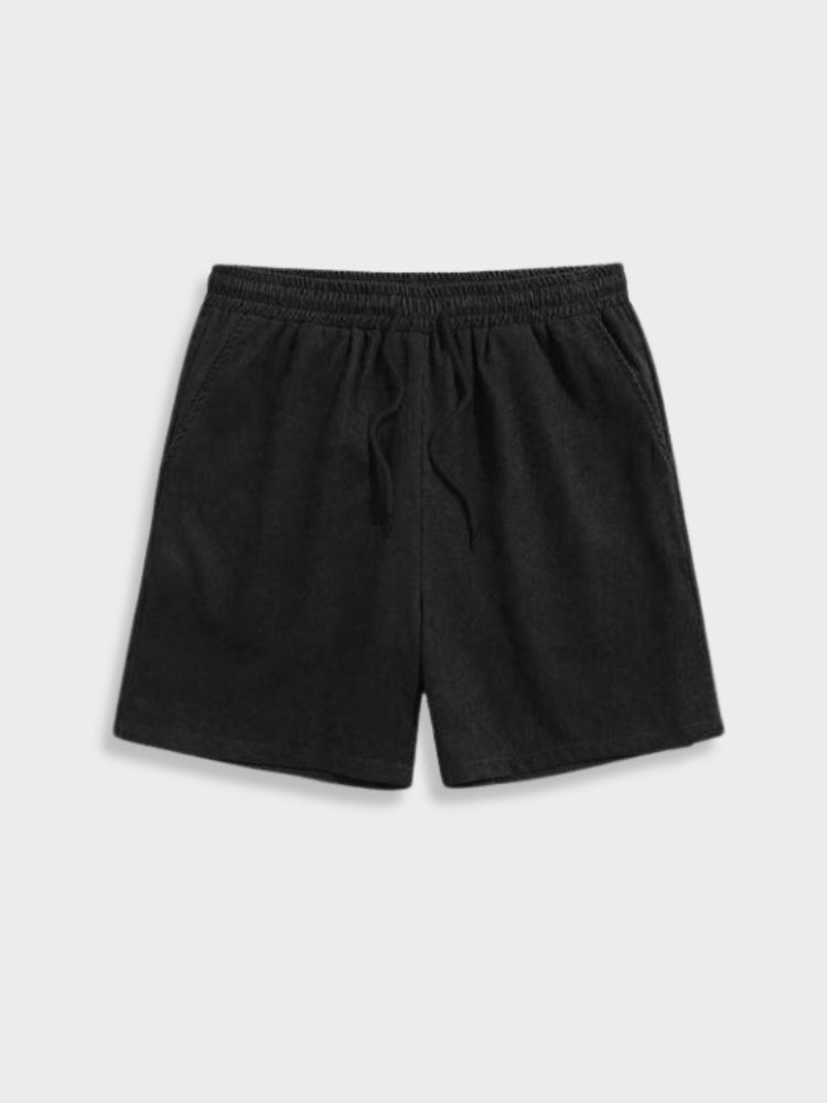 Men's beach-ready two-piece outfit. Relaxed fit short sleeve shirt and matching shorts for sunny days.