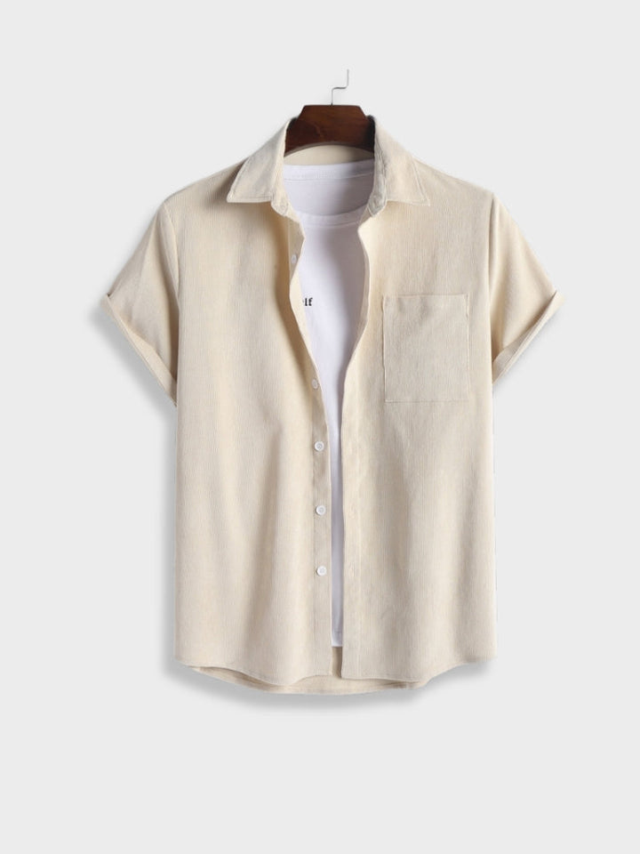 Stylish men's summer outfit: relaxed fit two-piece set with a short sleeve shirt and comfortable shorts.