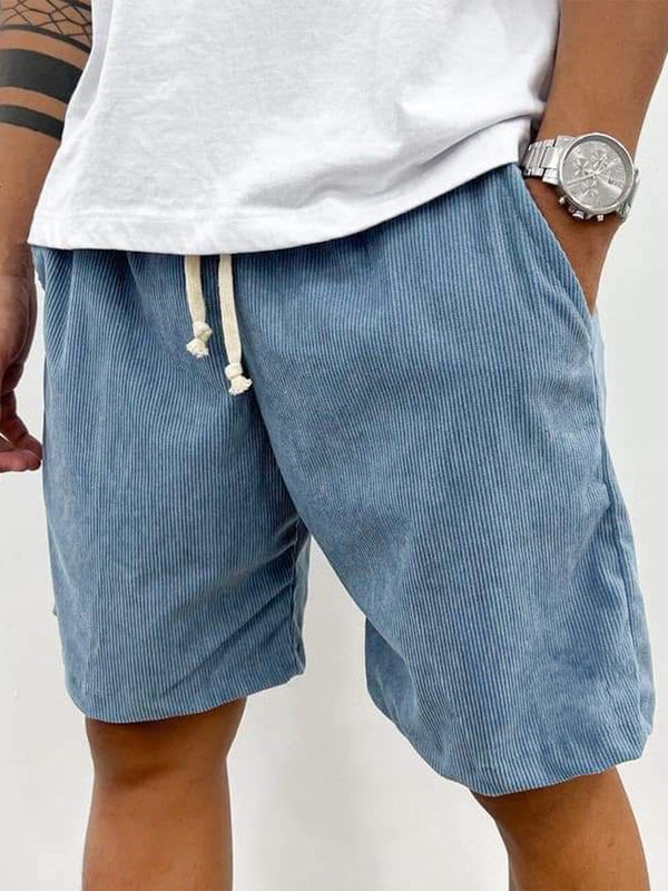 Men's relaxed fit textured drawstring shorts, perfect for summer comfort & casual everyday wear.