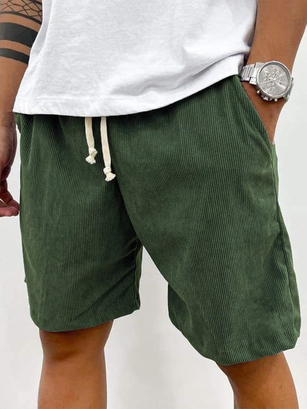 Men's summer vacation shorts: relaxed textured drawstring design for stylish beach & warm weather wear.