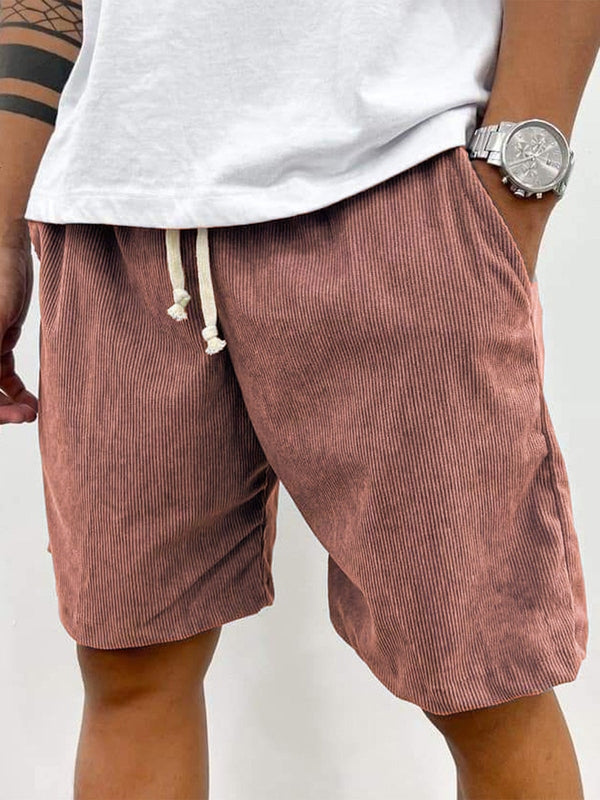 Adjustable drawstring textured men's shorts, relaxed fit for everyday comfort and summer style.