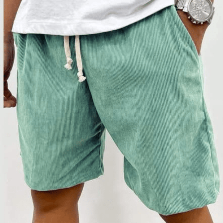 Effortlessly comfortable men's relaxed textured drawstring shorts for stylish summer & warm weather looks.