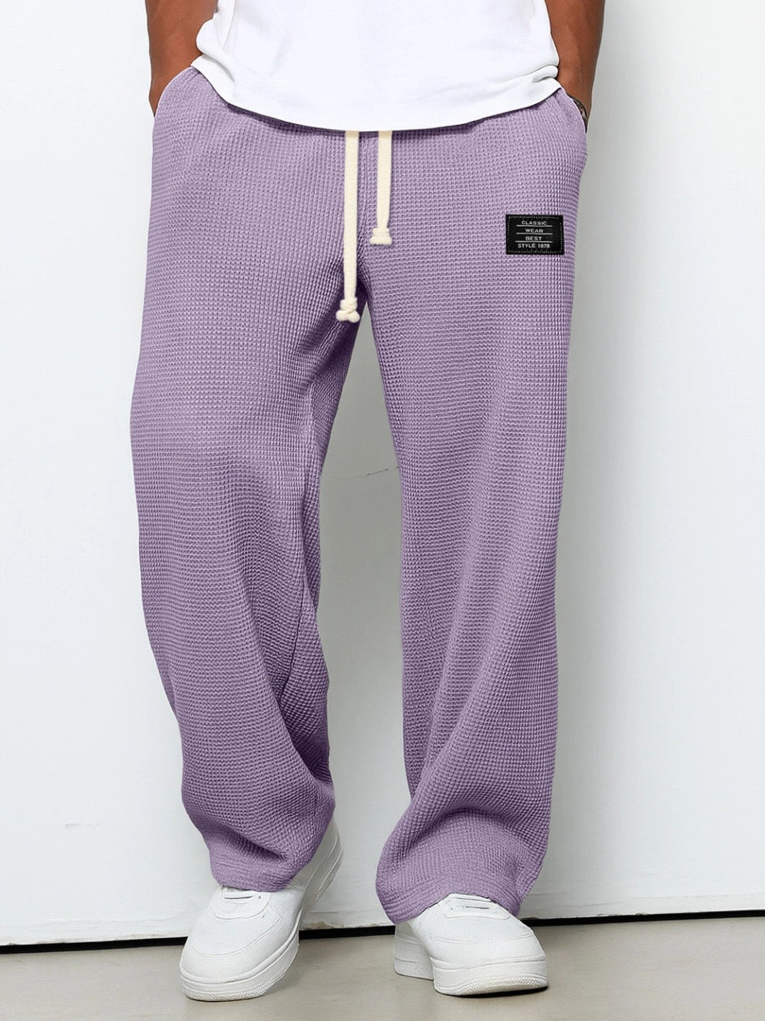 Men's versatile relaxed fit trousers, offering comfort and style.