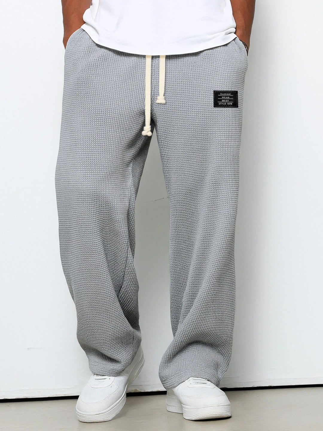 Versatile men's relaxed fit pants, great for smart casual or daily wear.
