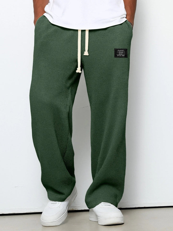 Smart casual men's pants, relaxed fit with breathable fabric.