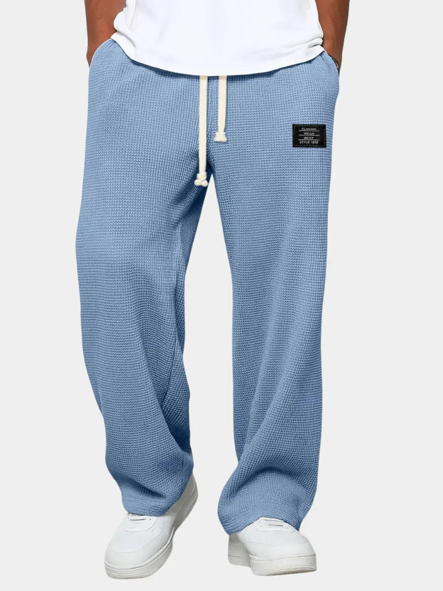 Men's relaxed fit trousers, ultimate comfort, versatile style for everyday wear.