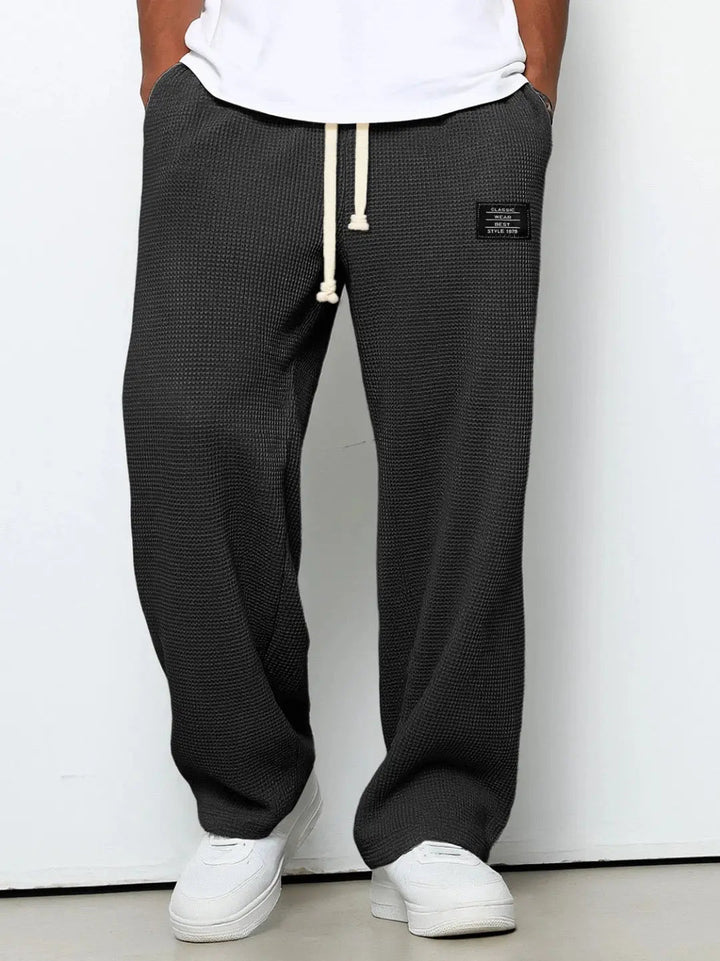 Men's fashion relaxed fit wide leg pants, comfortable for all-day wear.