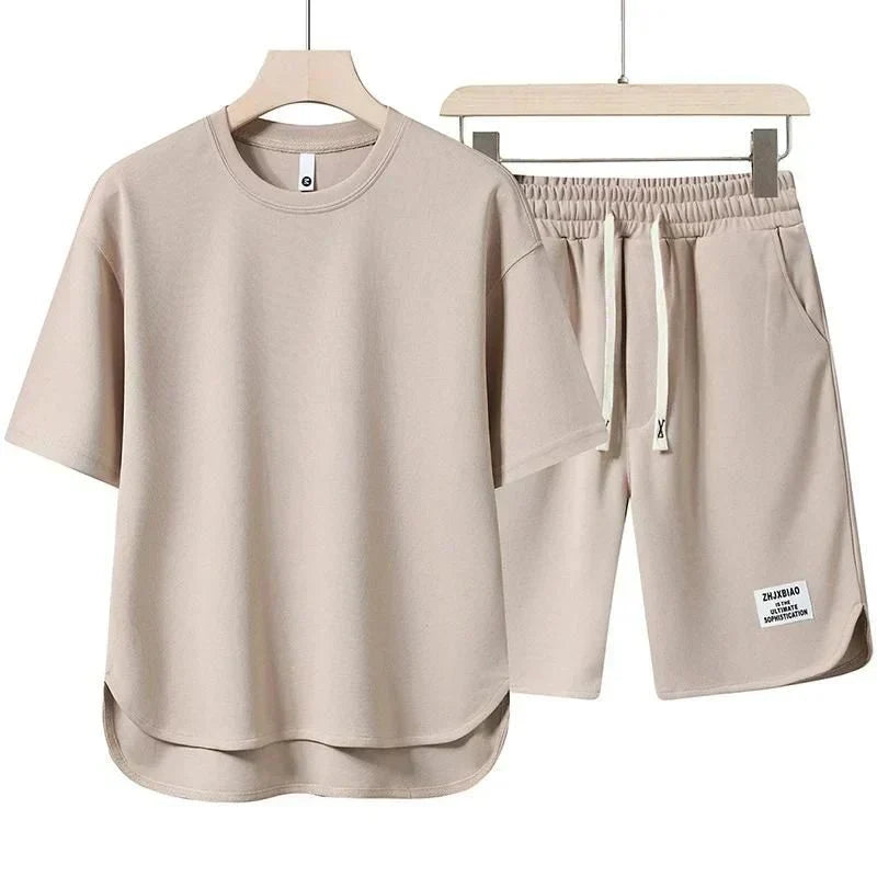 Men's relaxed fit two-piece set featuring a soft t-shirt and drawstring shorts, perfect for comfortable casual summer wear.