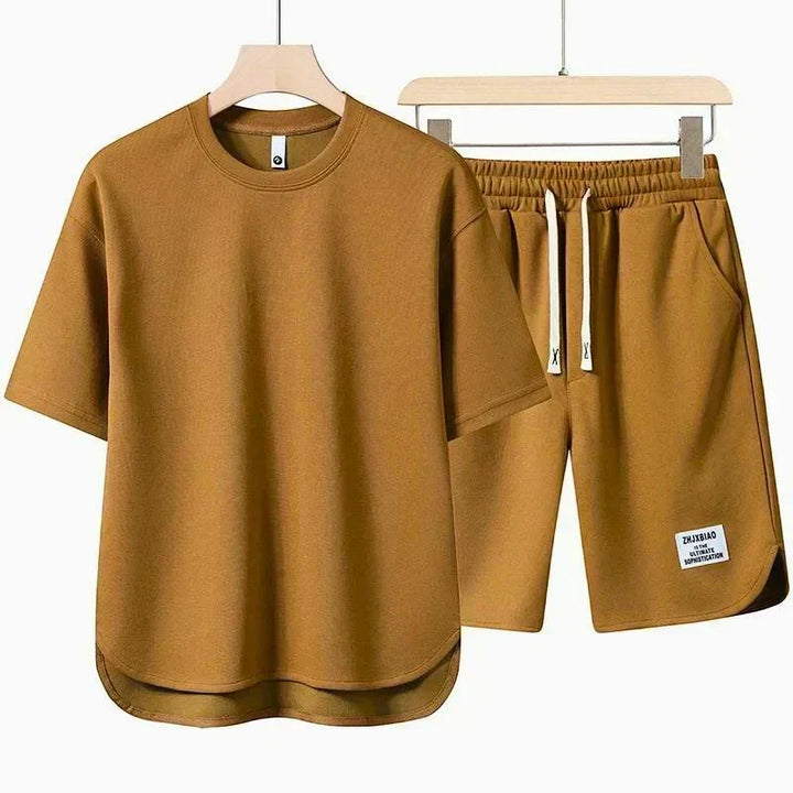 Men's relaxed fit two-piece t-shirt and drawstring shorts set for ultimate comfort and casual summer style.