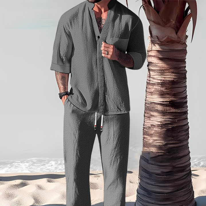 Comfortable men's matching set featuring a relaxed shirt & trousers, ideal as loungewear or for a stylish casual outfit.