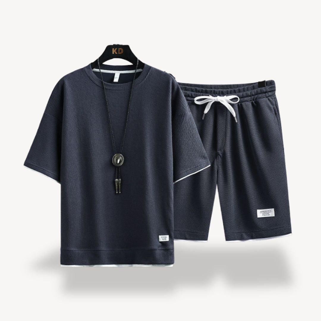 Summer men's relaxed fit shorts and t-shirt set. Casual comfort, perfect for lounging.