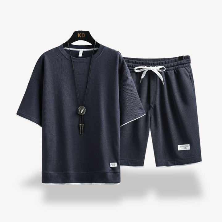 Summer men's relaxed fit shorts and t-shirt set. Casual comfort, perfect for lounging.
