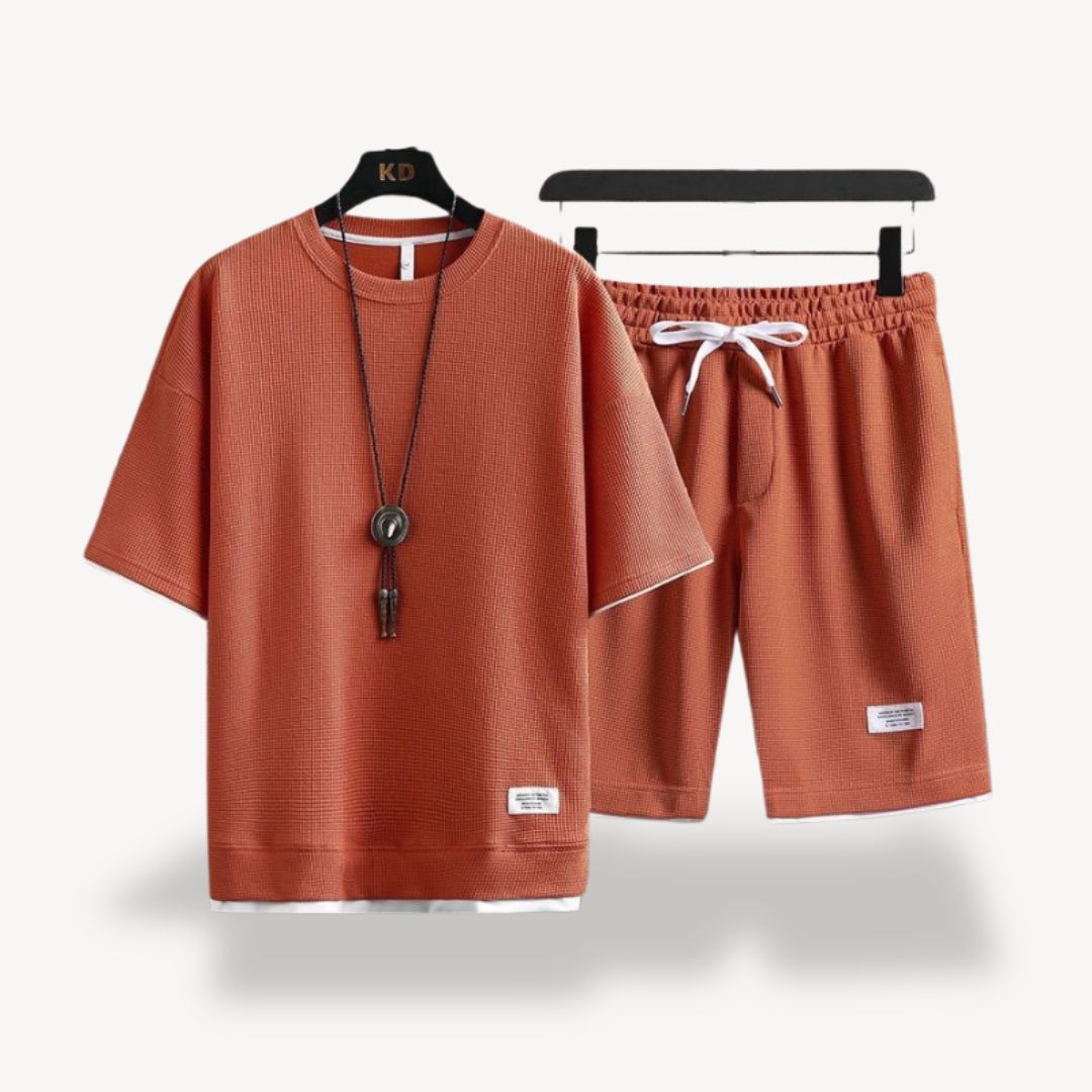 Stylish men's two-piece relaxed fit shorts set. Ideal casual loungewear & summer outfit.