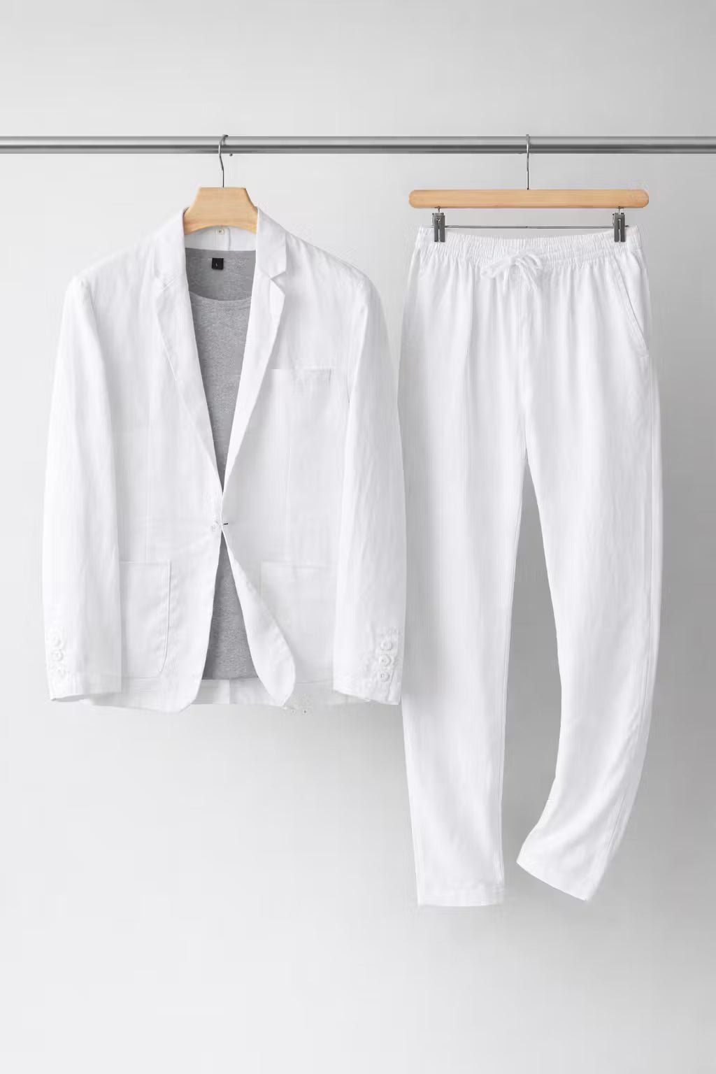 Effortlessly stylish men's relaxed fit two-piece suit, comfortable for formal or smart casual spring/summer occasions.