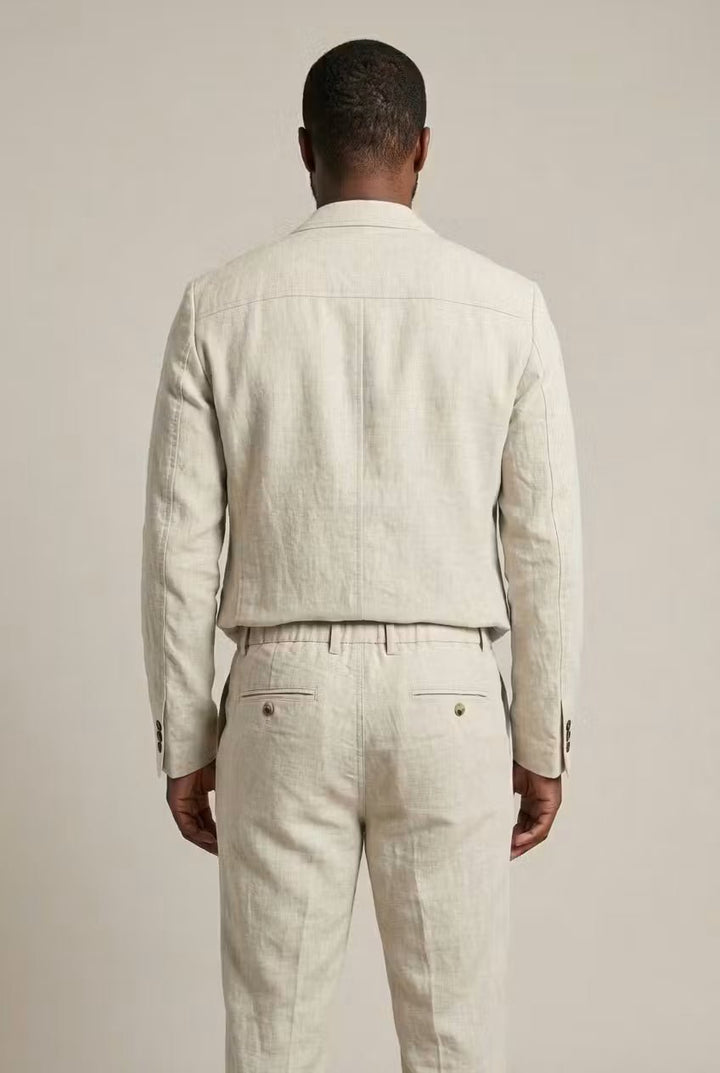 Man wearing a relaxed fit two-piece suit, showcasing effortless style for smart casual spring/summer events.