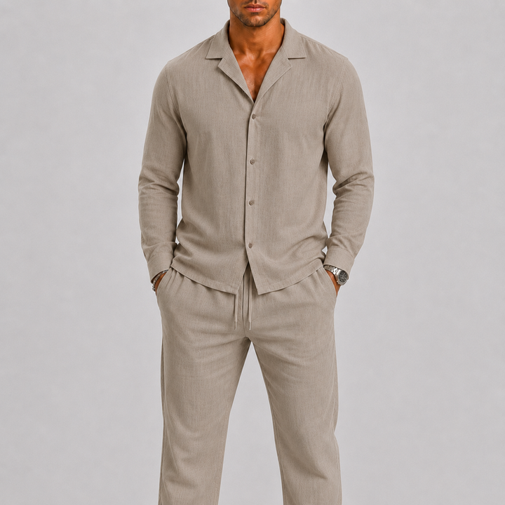 Stylish men's spring summer two-piece outfit. Relaxed fit shirt & trousers for a chic, casual look.