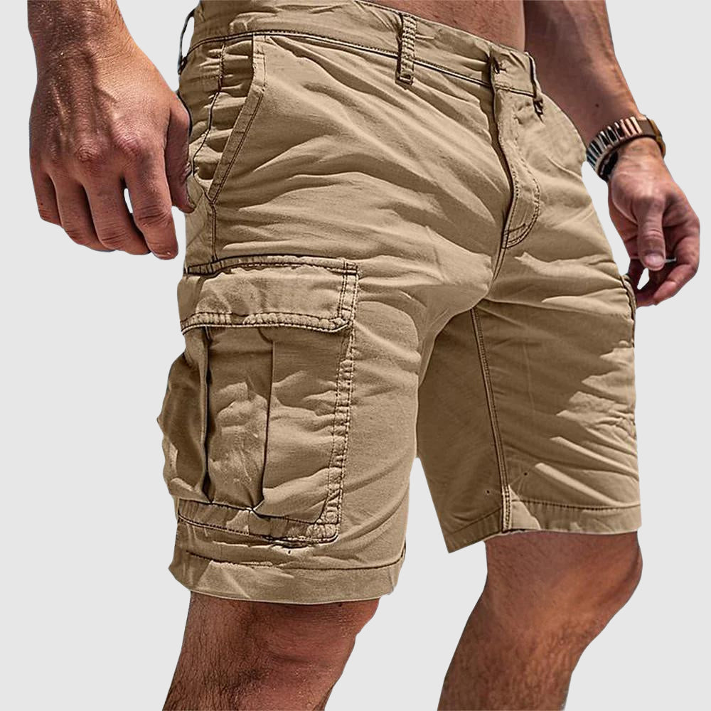 Man wearing comfortable men's relaxed fit utility cargo shorts, ready for summer adventures or casual outings.