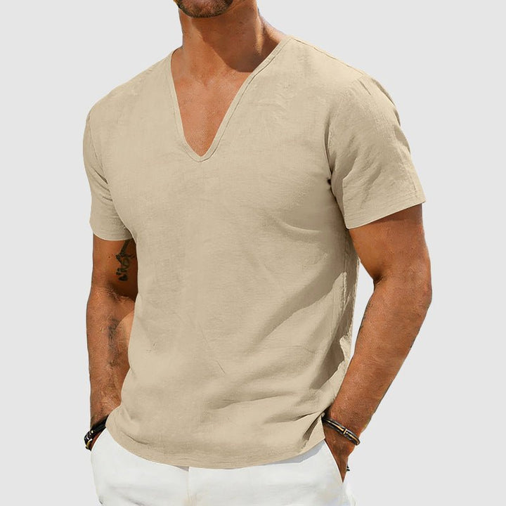 Stylish men's V-neck t-shirt, relaxed fit, perfect for warm weather casual and smart casual outfits.