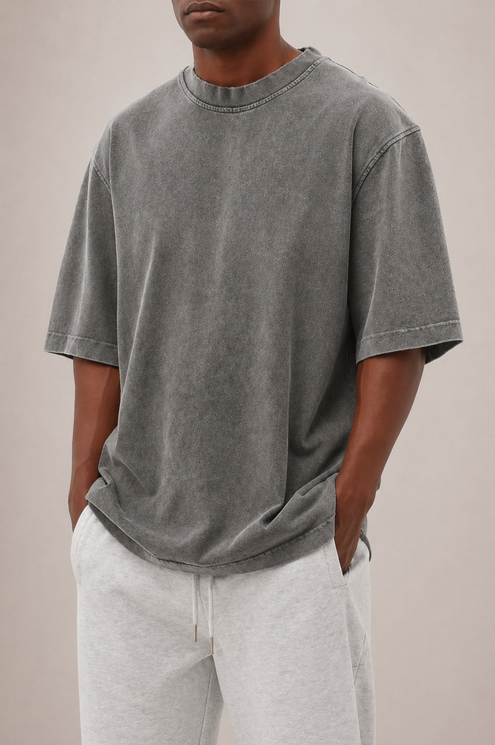 Basic men's relaxed fit washed t-shirt with a round neck, essential for comfortable everyday casual style.