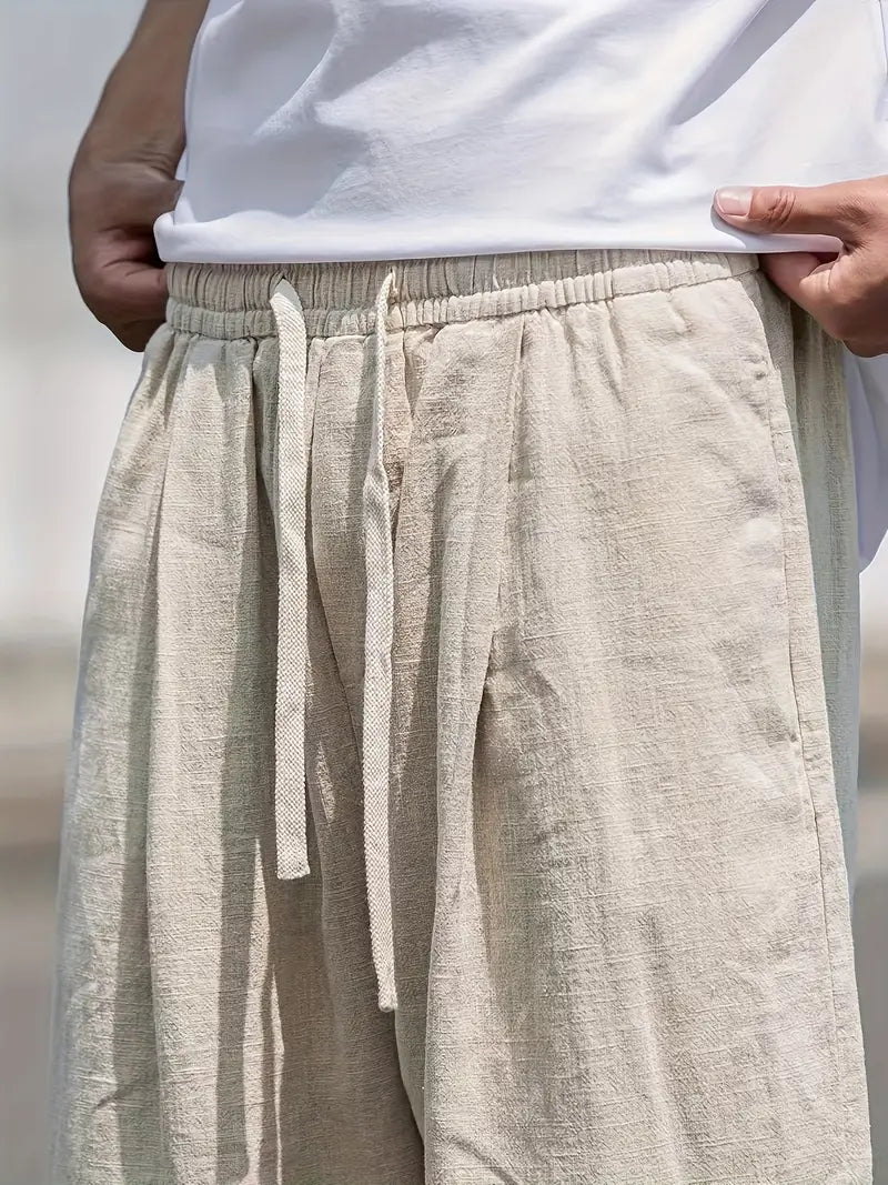 Versatile men's relaxed fit wide leg trousers, great casual bottoms for streetwear and warm weather style.