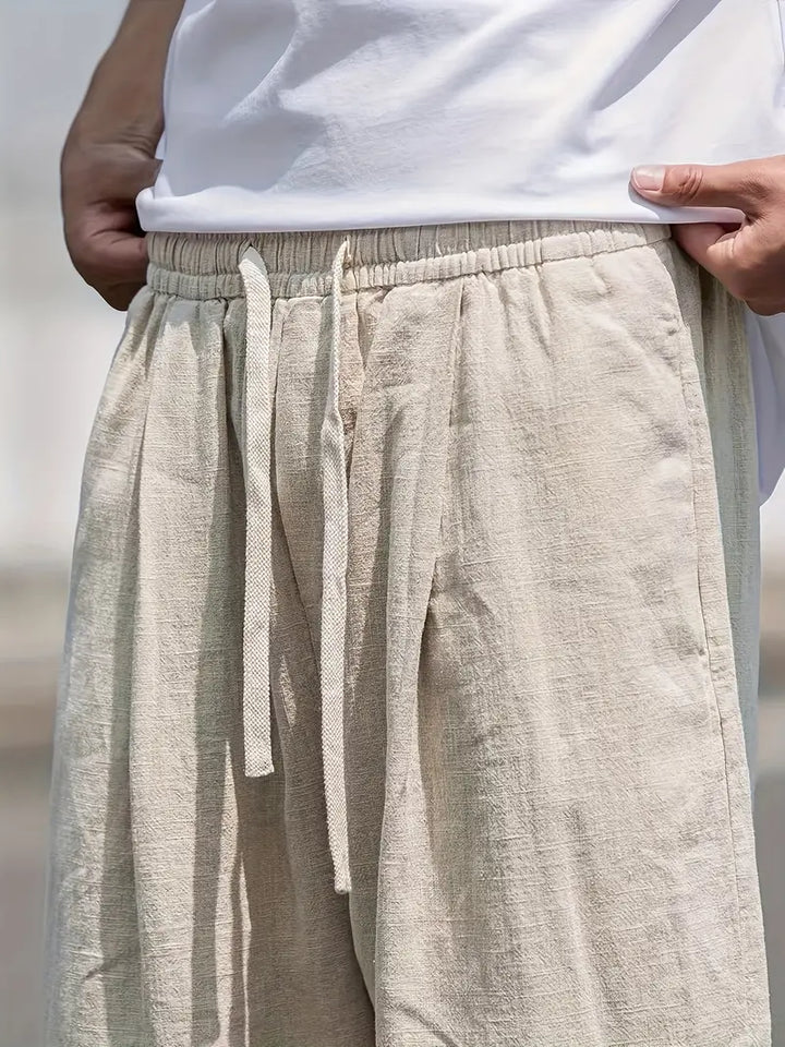 Versatile men's relaxed fit wide leg trousers, great casual bottoms for streetwear and warm weather style.