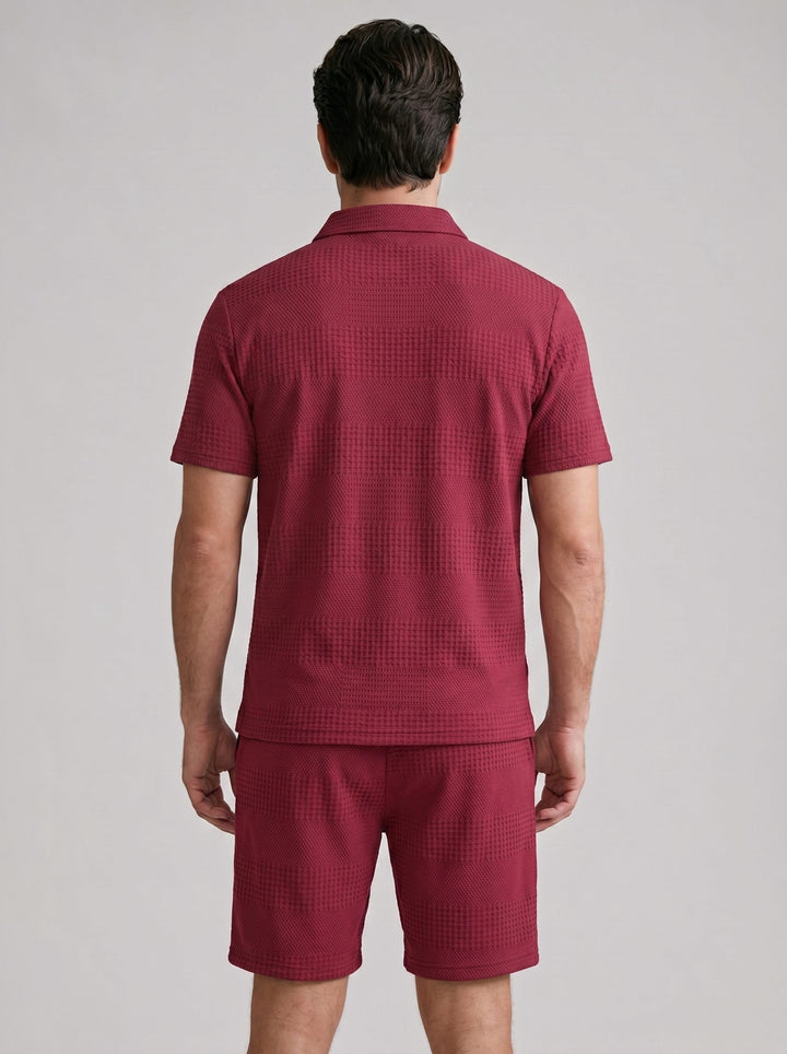 Warm weather men's knitwear: Relaxed polo shirt and matching shorts ensemble.