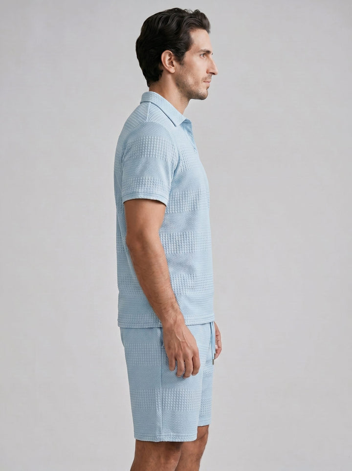 Relaxed men's knit polo shirt and shorts set, perfect for everyday summer style.