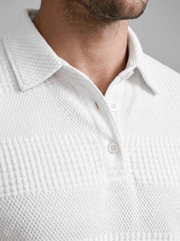 Casual men's loungewear set with a textured knit polo and coordinating shorts.