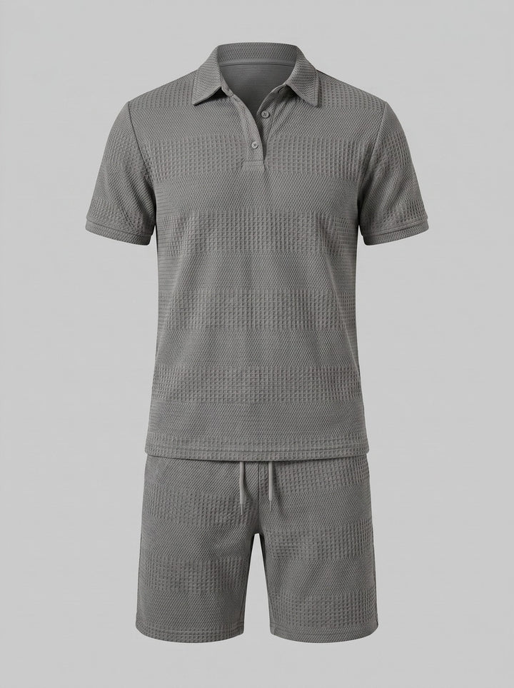 Warm weather men's fashion: Relaxed knit polo shirt and shorts coordinated set.