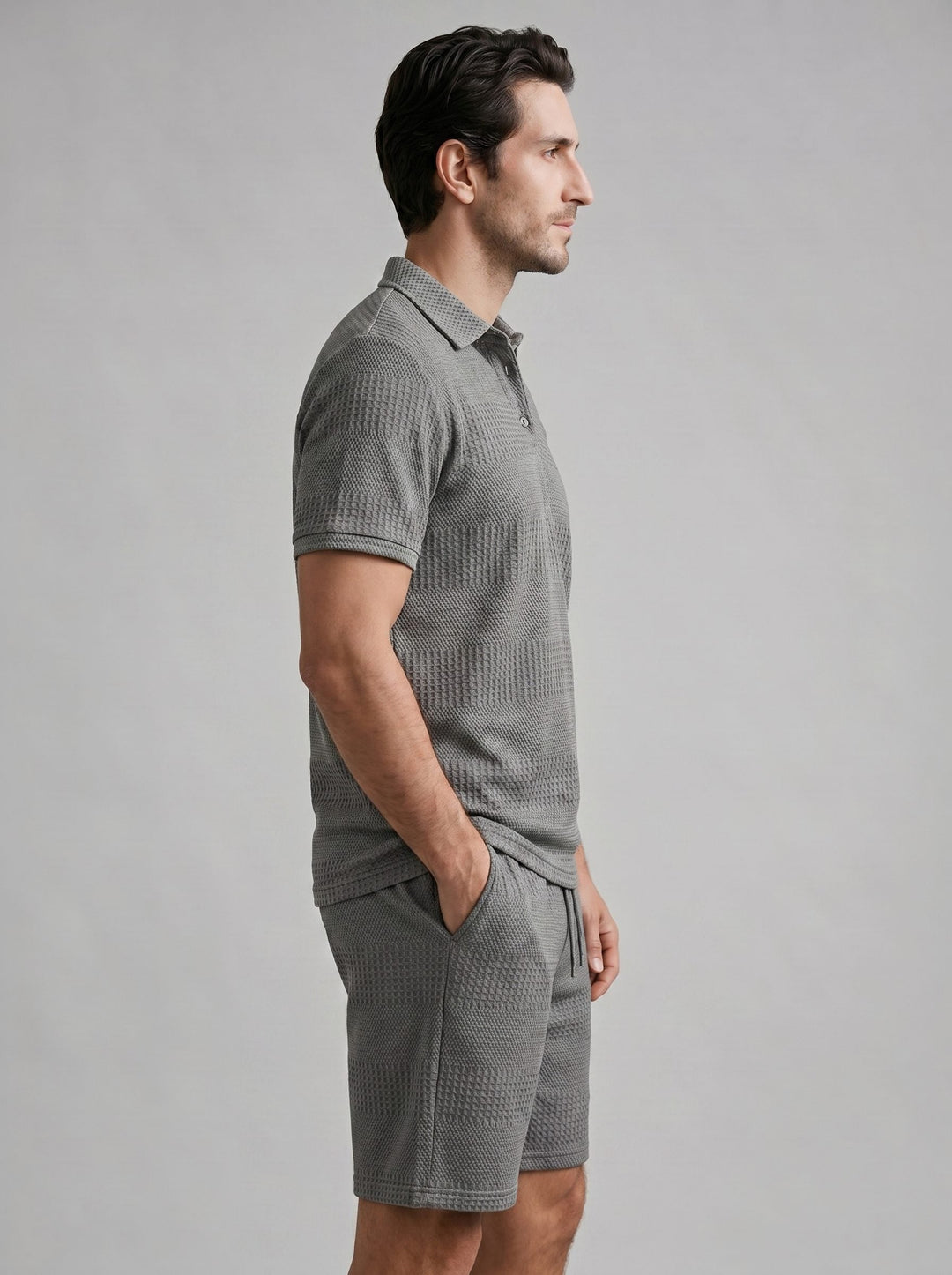 Stylish men's two-piece knitwear set for summer casual and loungewear.