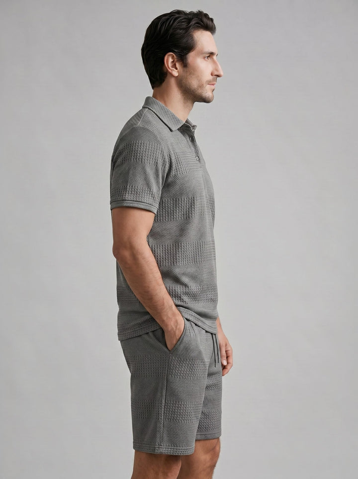 Stylish men's two-piece knitwear set for summer casual and loungewear.