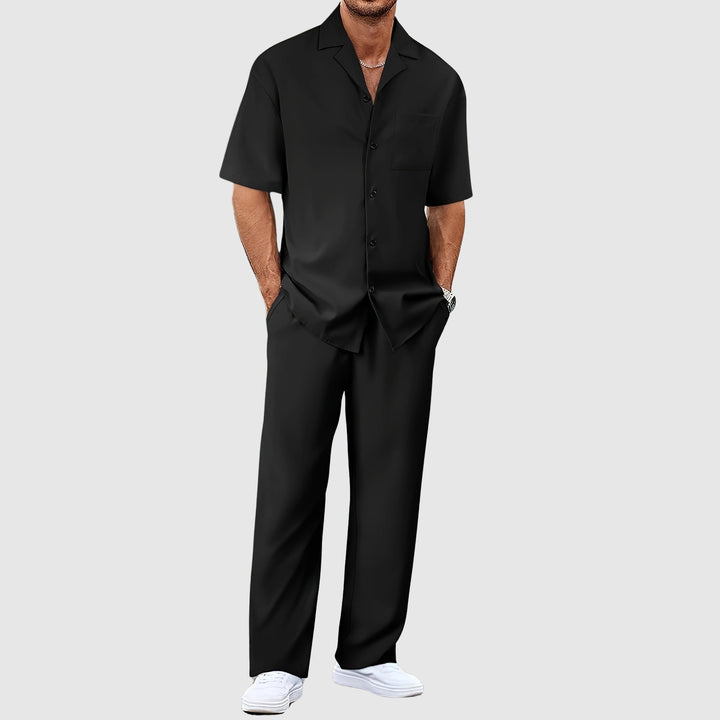 Relaxed fit men's two-piece co-ord set: revere collar top & matching trousers. Ideal for summer style.