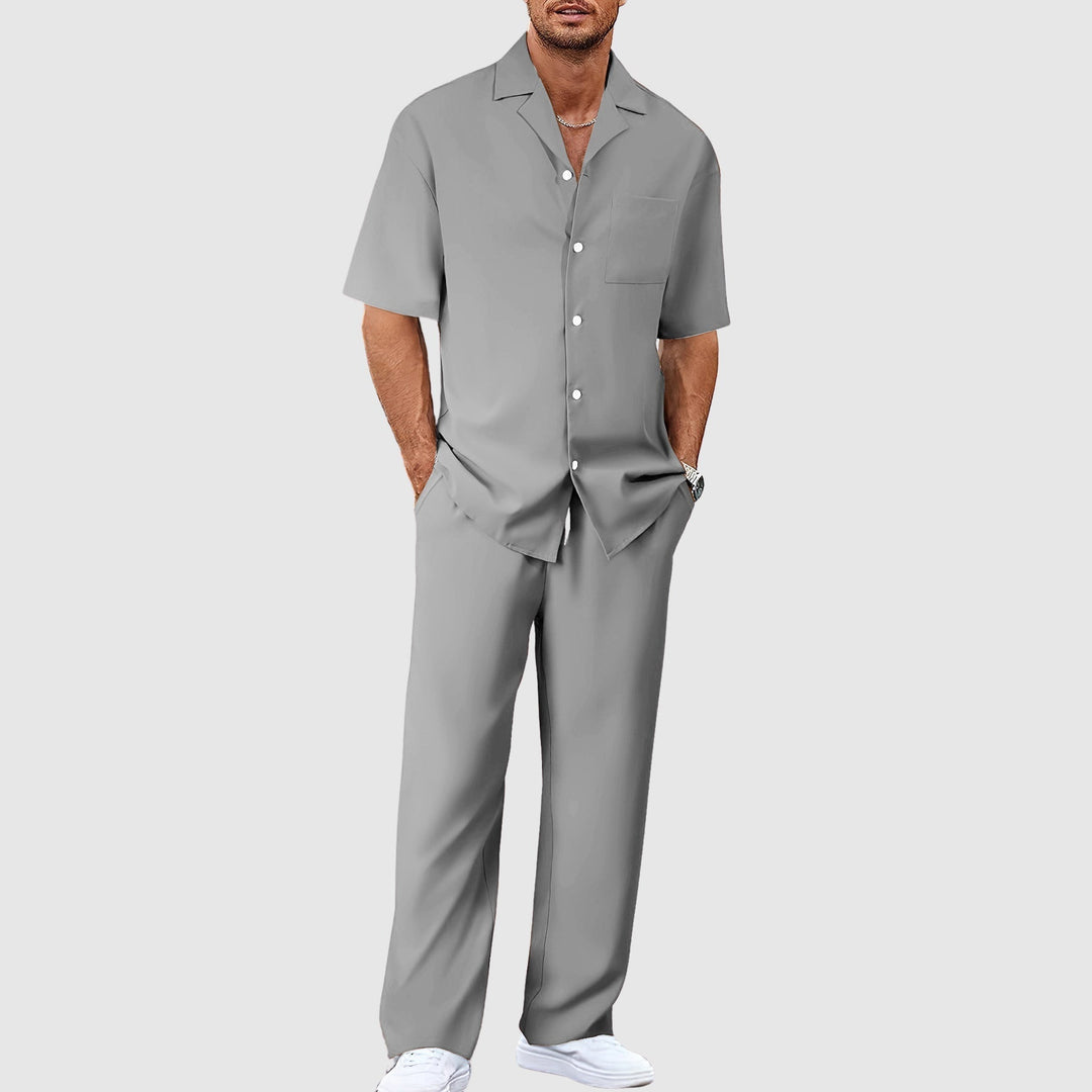 Stylish men's matching resort set with revere collar shirt and comfortable relaxed trousers for holidays.