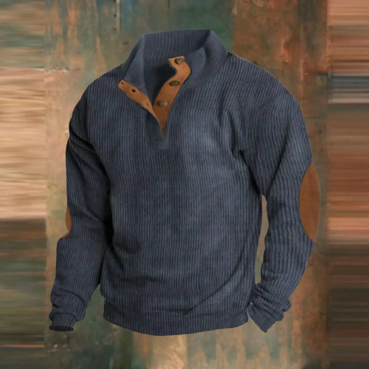 Comfortable men's ribbed quarter-snap pullover sweater, ideal for cold weather layering with heritage elbow patches.