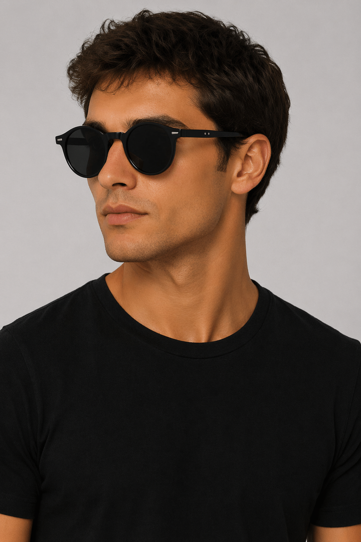Dark lens men's round retro sunglasses, offering stylish sun protection and classic eyewear.