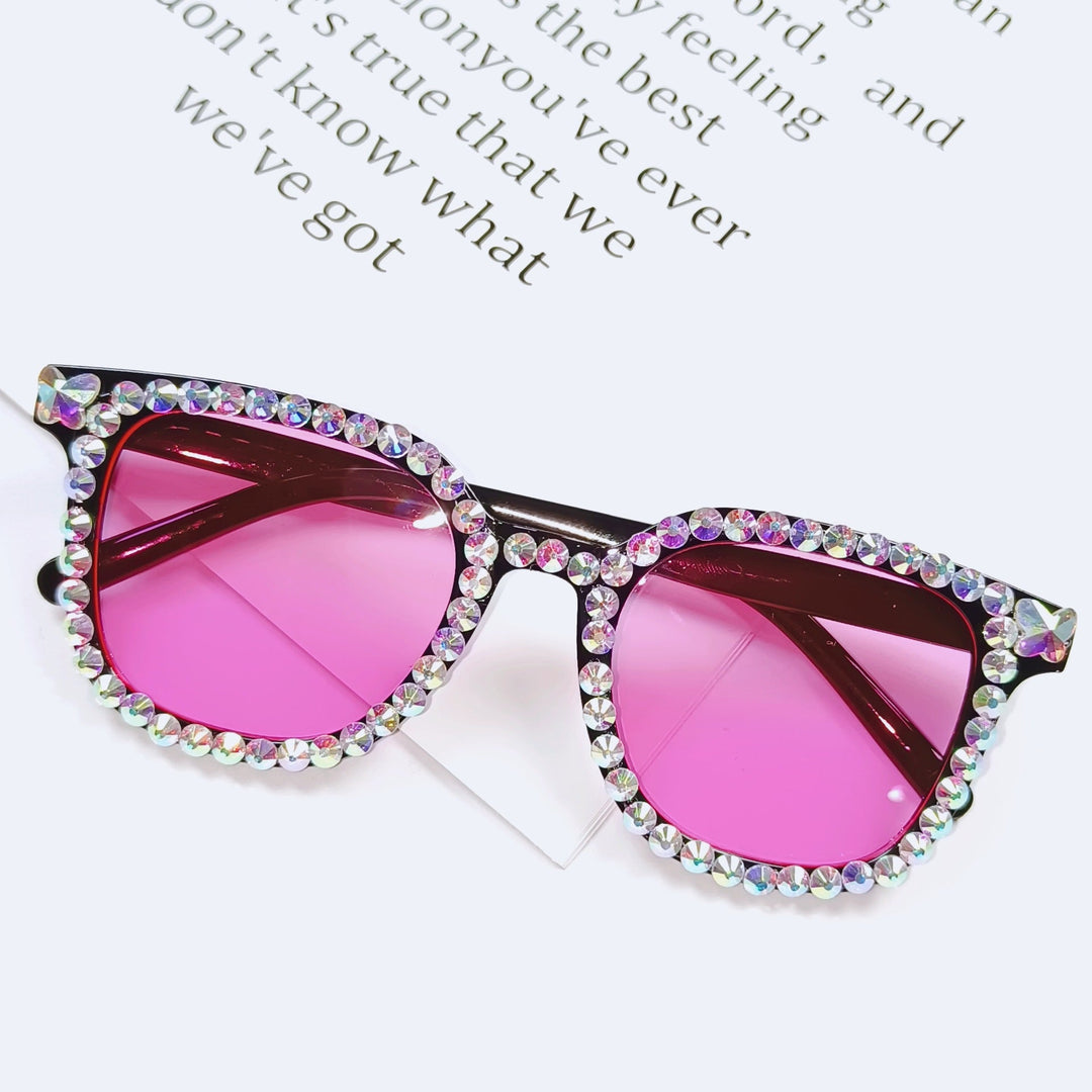 Glamorous men's rhinestone sunglasses, cat-eye design. Offers UV protection for stylish fashion.