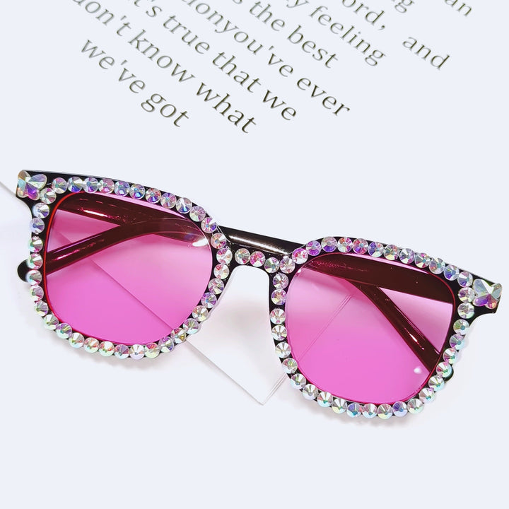 Glamorous men's rhinestone sunglasses, cat-eye design. Offers UV protection for stylish fashion.
