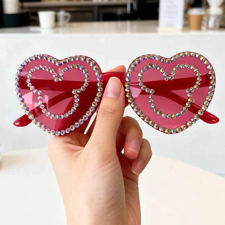 Unique men's rhinestone heart-shaped sunglasses. Trendy fashion accessory with UV protection for festivals.