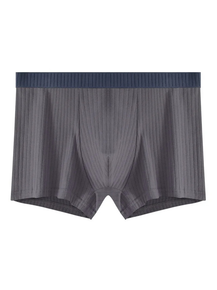 Unpacked set of men's ribbed boxer briefs (6-pack), highlighting the breathable fabric and classic design.